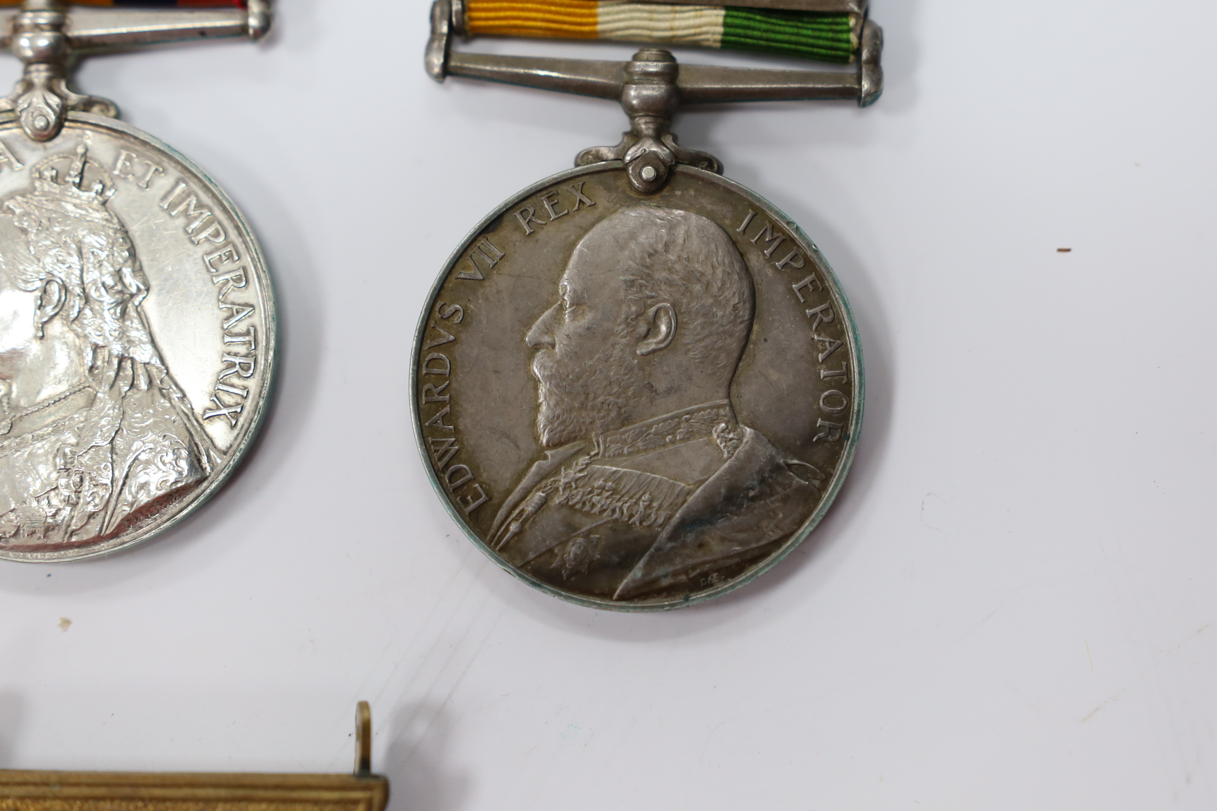 Assorted medals; two replica British North Borneo medals; Balaklava medallion; bronze GV medal; German China Campaign medal; bronze NRA medallion, unnamed